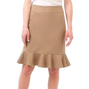 Model wearing Rekucci''s skirt in Camel color. Wearing black strappy high heel shoes