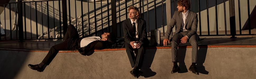 three young men in suits